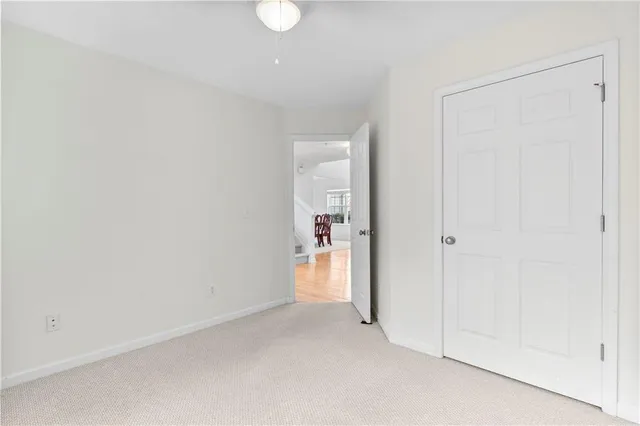 a living room with a couch and a large window