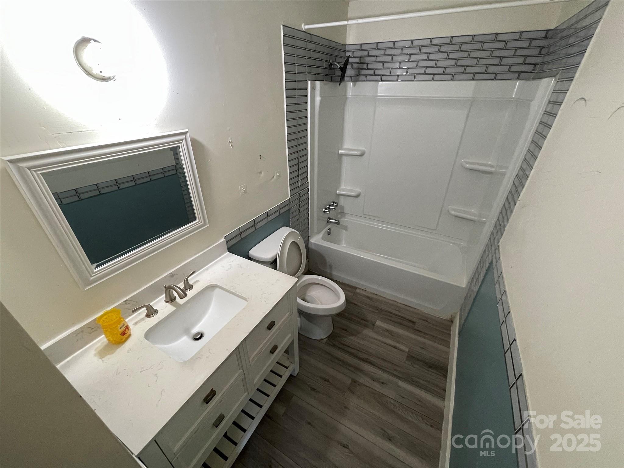 28 Maiden Lane York, SC 29745 - Photo 15 of 22 a bathroom with a sink a toilet and shower