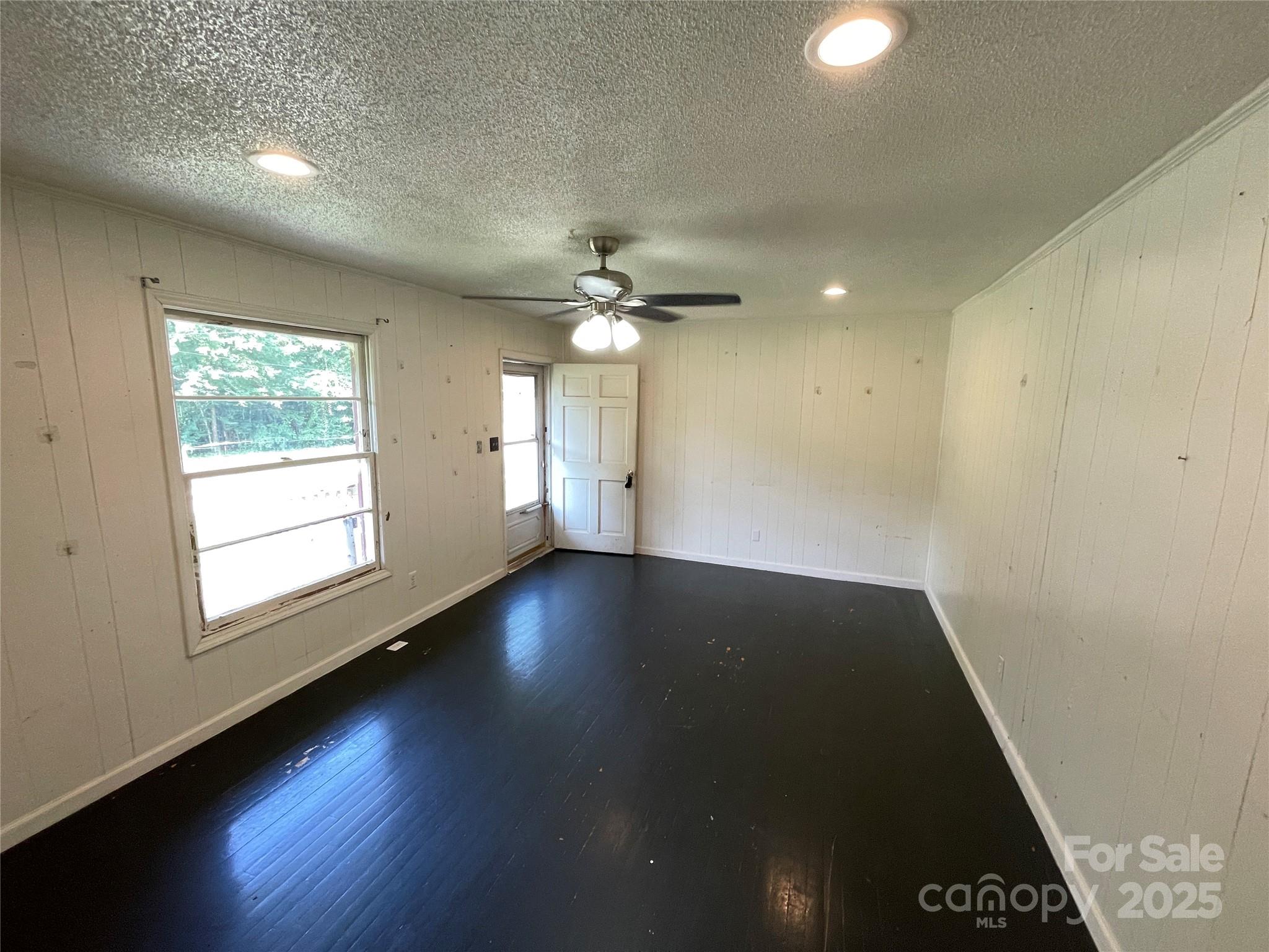 28 Maiden Lane York, SC 29745 - Photo 18 of 22 an empty room with wooden floor and windows