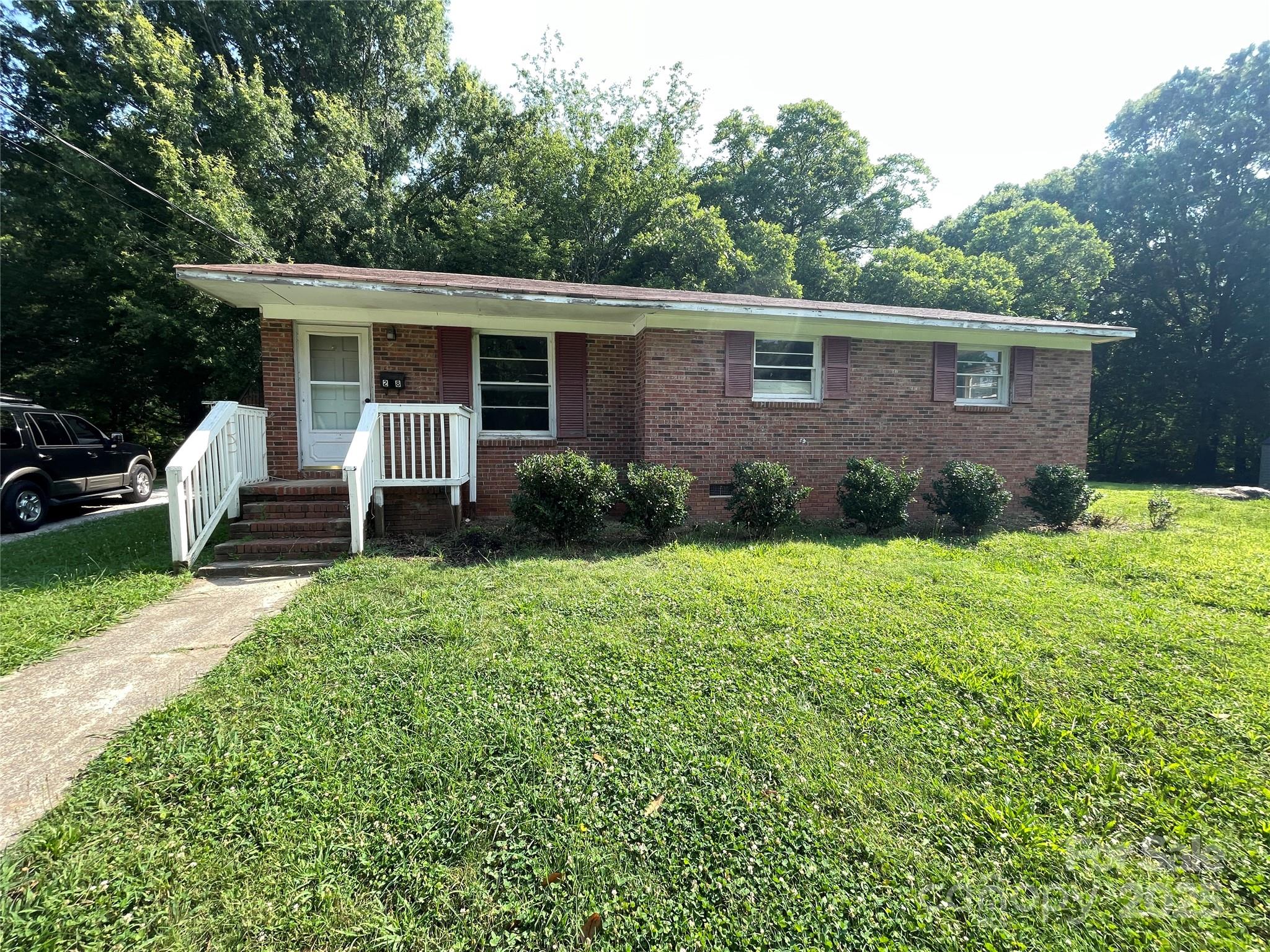 28 Maiden Lane York, SC 29745 - Photo 2 of 22 a view of a house with a yard