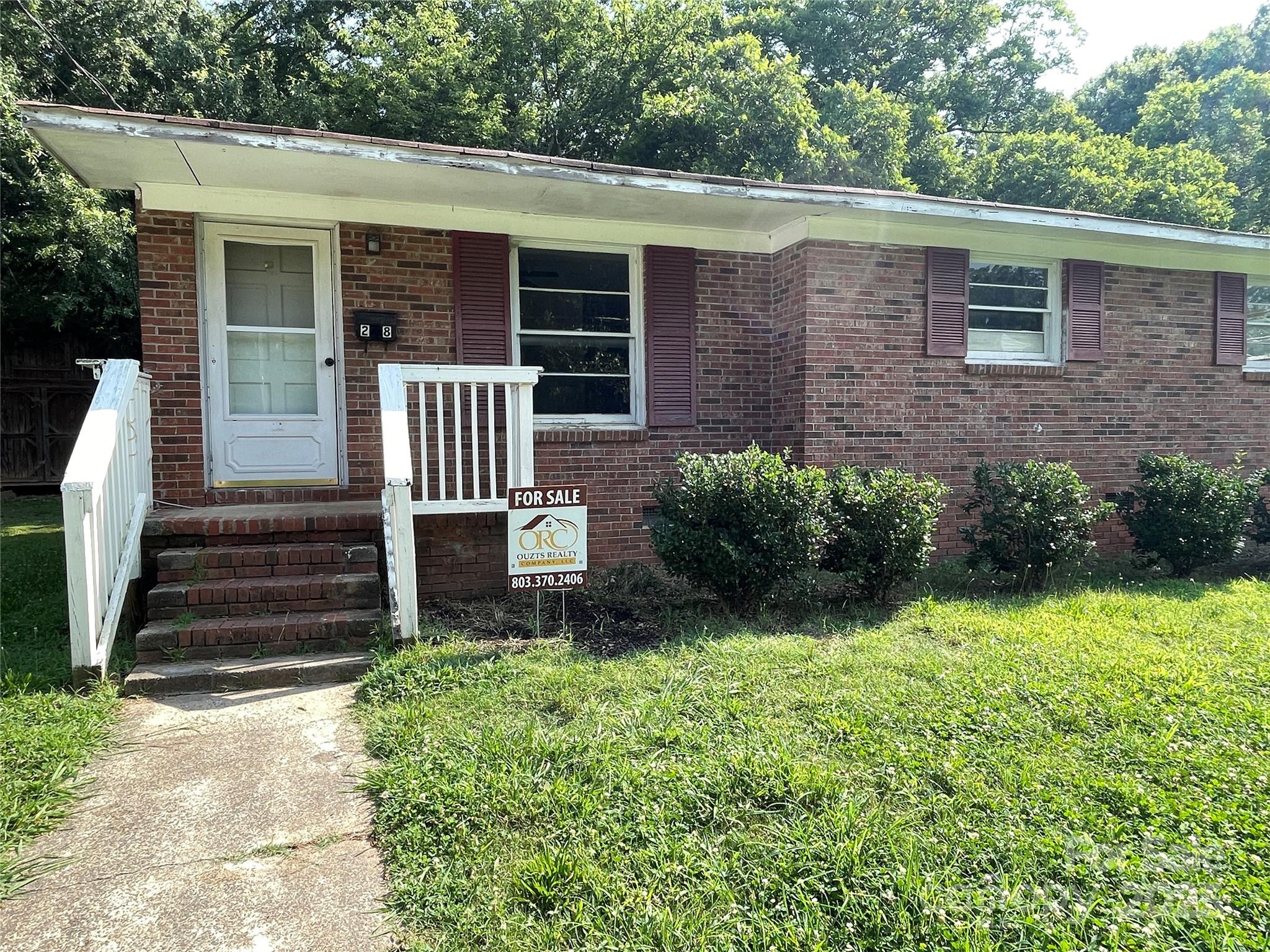 28 Maiden Lane York, SC 29745 - Photo 22 of 22 a front view of a house with a yard