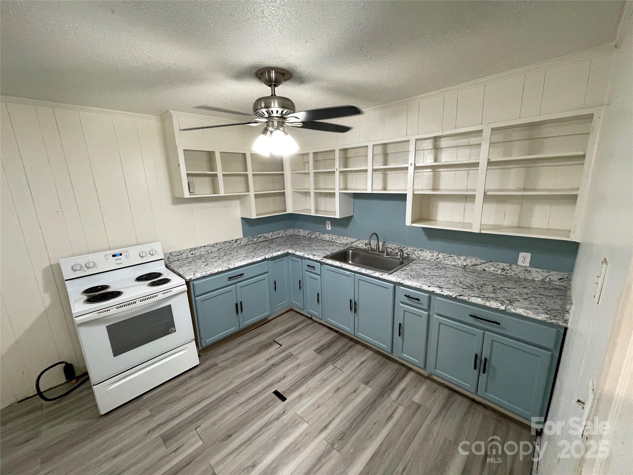 28 Maiden Lane York, SC 29745 - Photo 5 of 22 a kitchen with a stove oven and cabinets