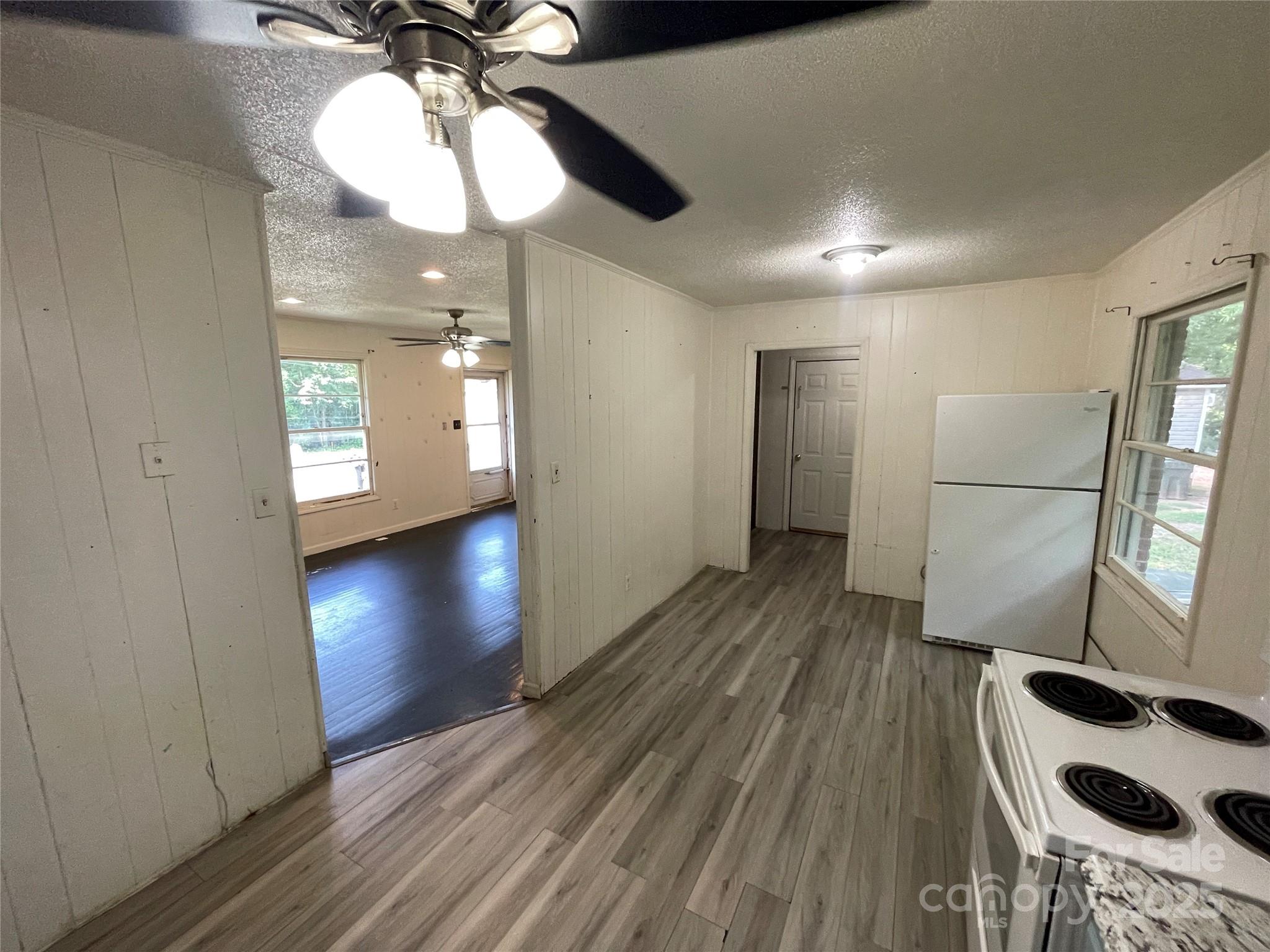 28 Maiden Lane York, SC 29745 - Photo 8 of 22 a view of a livingroom with wooden floor
