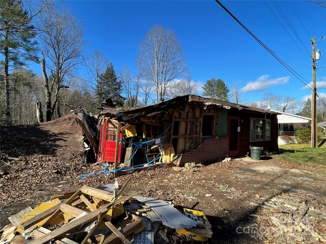 a view of a house with a snow on the ground