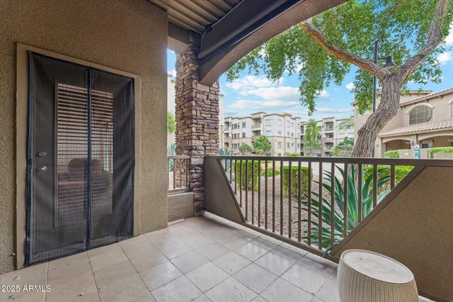 a large building with a yard in front of it