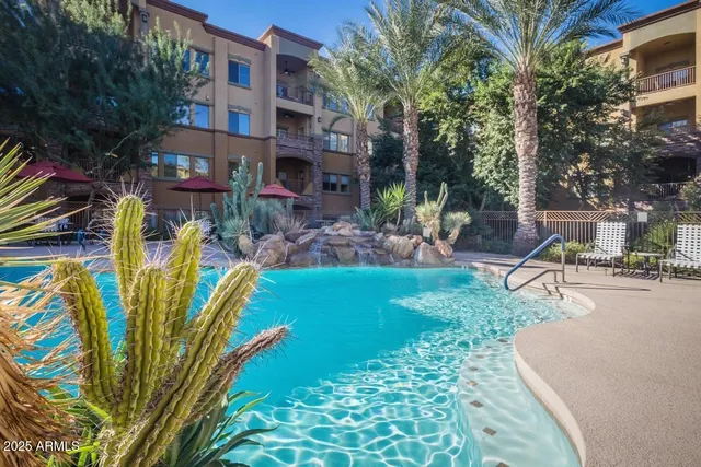 a outdoor living space with furniture and city view