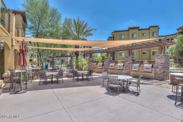 a view of outdoor space with chairs