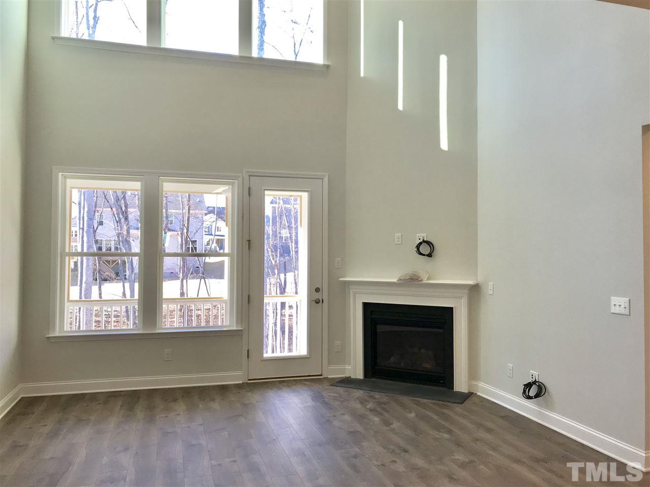 2506 Rambling Creek Road, Unit 32 Apex, NC 27523 - Photo 7 of 30 Spacious 2 story family room with fireplace