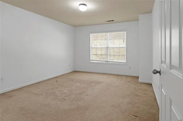 an empty room with an entryway