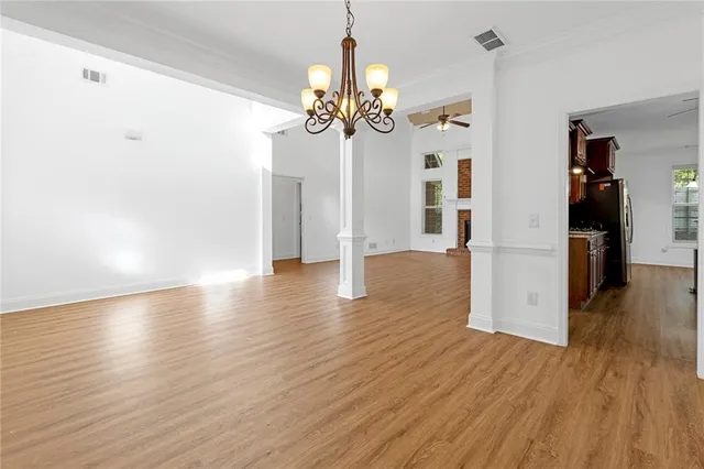 a view of a livingroom with wooden floor
