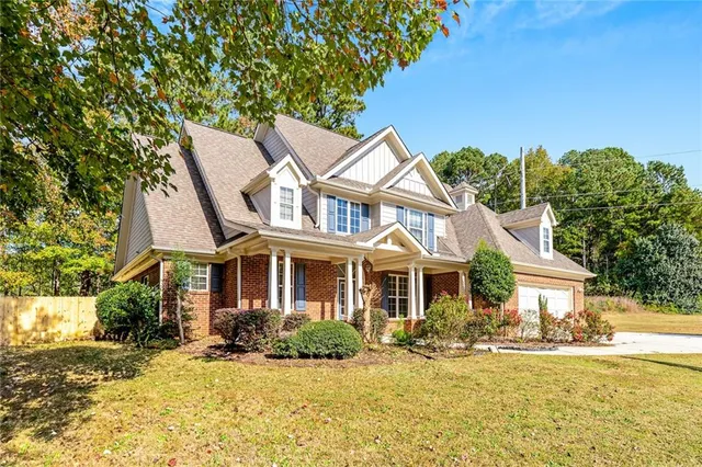 front view of a house with a ocean view