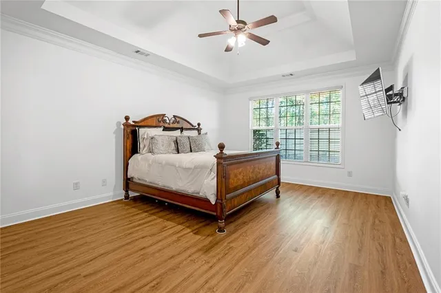 a bed room with a bed and a window