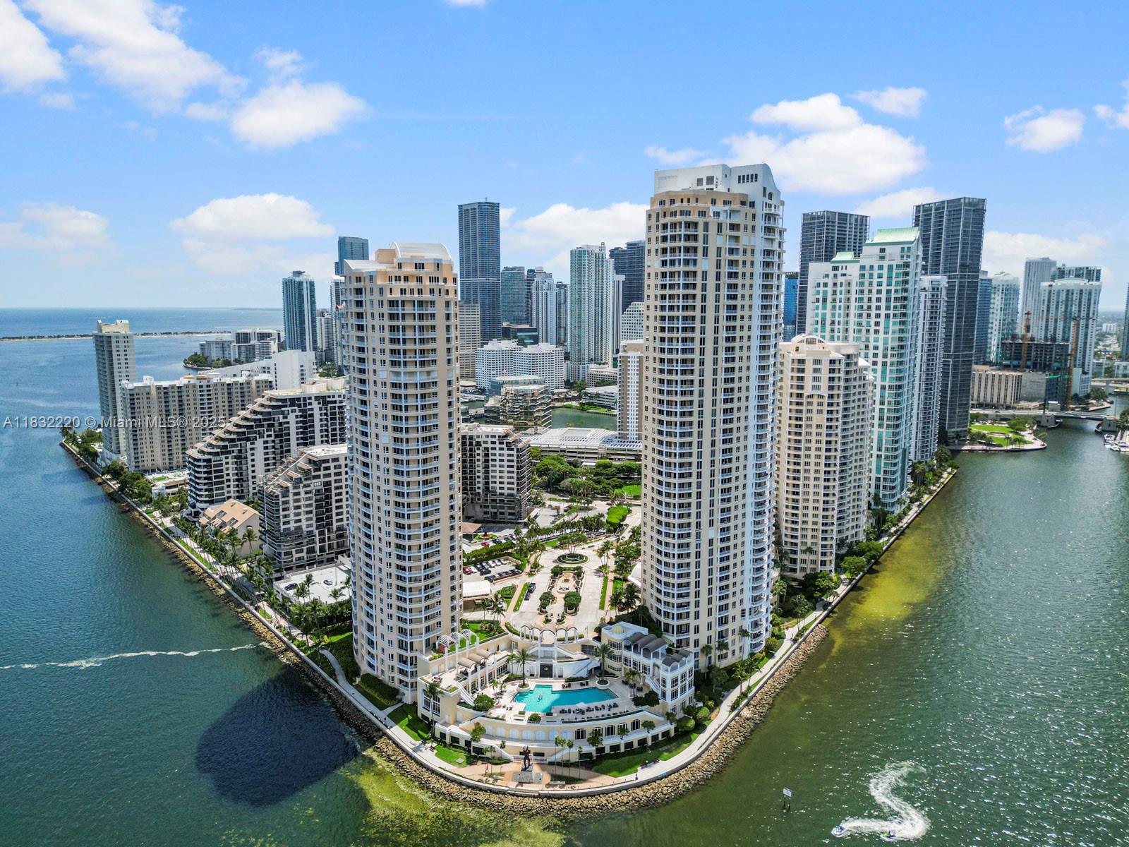 a view of a city with tall buildings