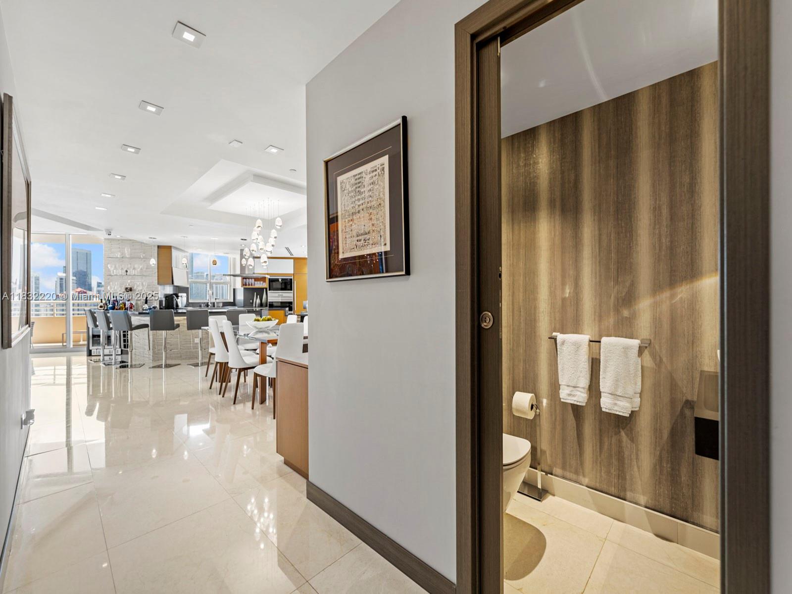 808 Brickell Key Drive, Unit 3208 Miami, FL 33131 - Photo 29 of 45 a view of a dining room with furniture
