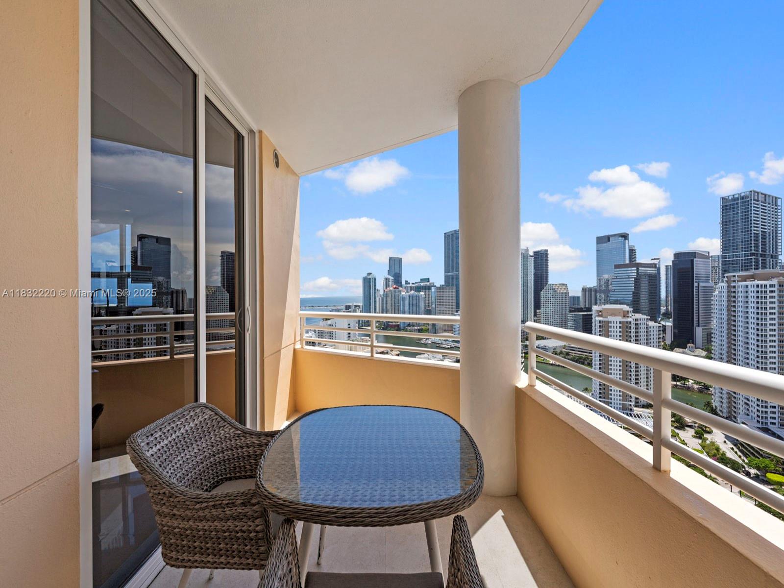 808 Brickell Key Drive, Unit 3208 Miami, FL 33131 - Photo 34 of 45 a view of a city from a balcony