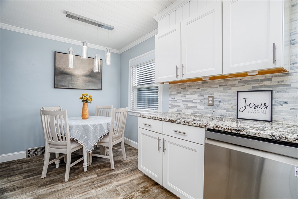 37 Rouville Avenue Gardner, MA 01440 - Photo 12 of 42 a dining table with chairs and cabinets
