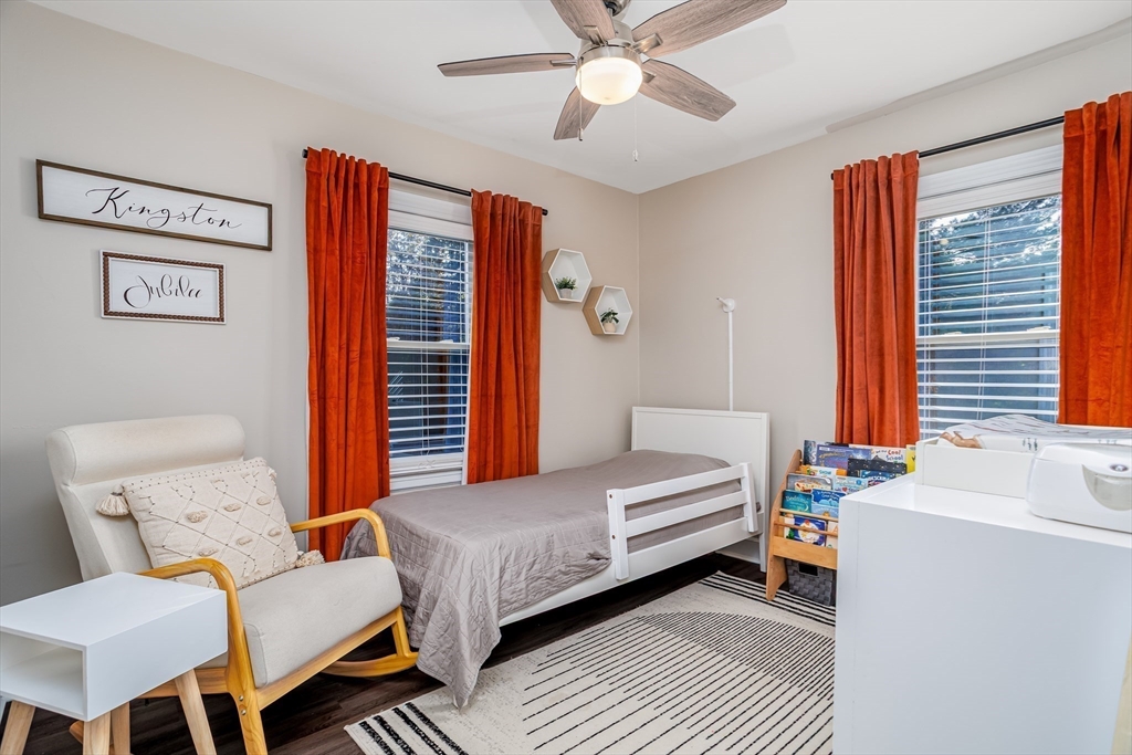 37 Rouville Avenue Gardner, MA 01440 - Photo 21 of 42 a bedroom with a bed and a chandelier