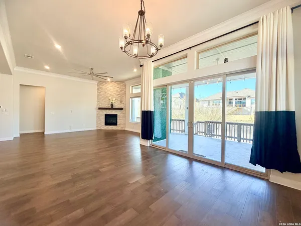 a large kitchen with kitchen island a sink stainless steel appliances and cabinets