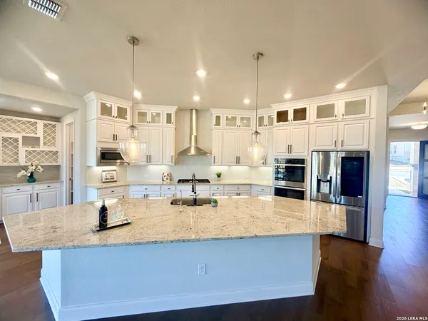 a view of a kitchen and window