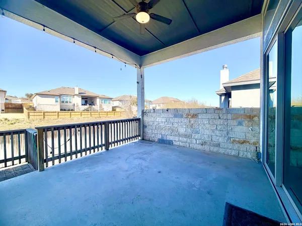 a view of a hallway with a livingroom