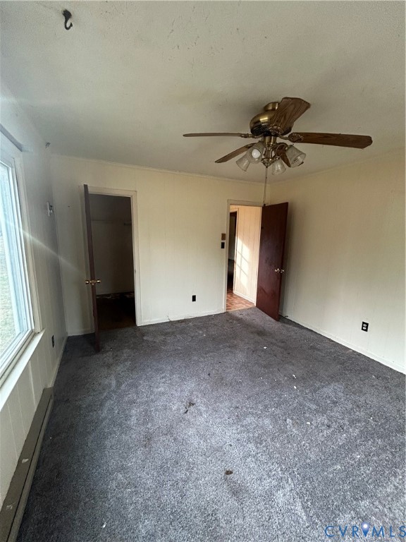 24915 River Road Petersburg, VA 23803 - Photo 9 of 16 a view of a livingroom with a ceiling fan and window