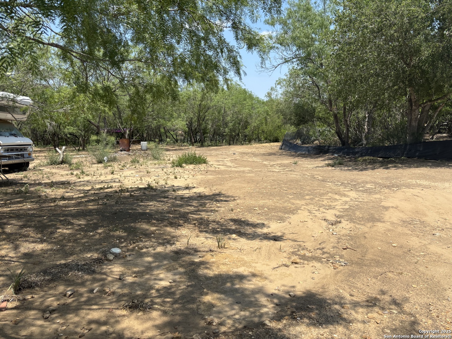 5353 Labus Road Elmendorf, TX 78112 - Photo 9 of 11 a view of ocean view with large trees