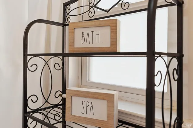 a view of a house with a wooden floor and a chair