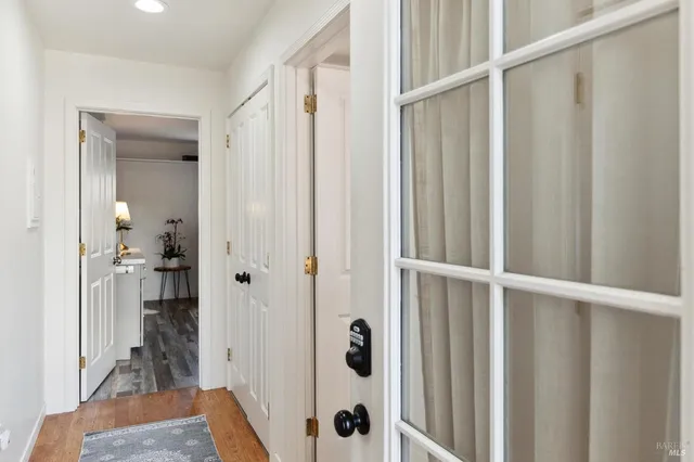 a front view of house with trees in the background