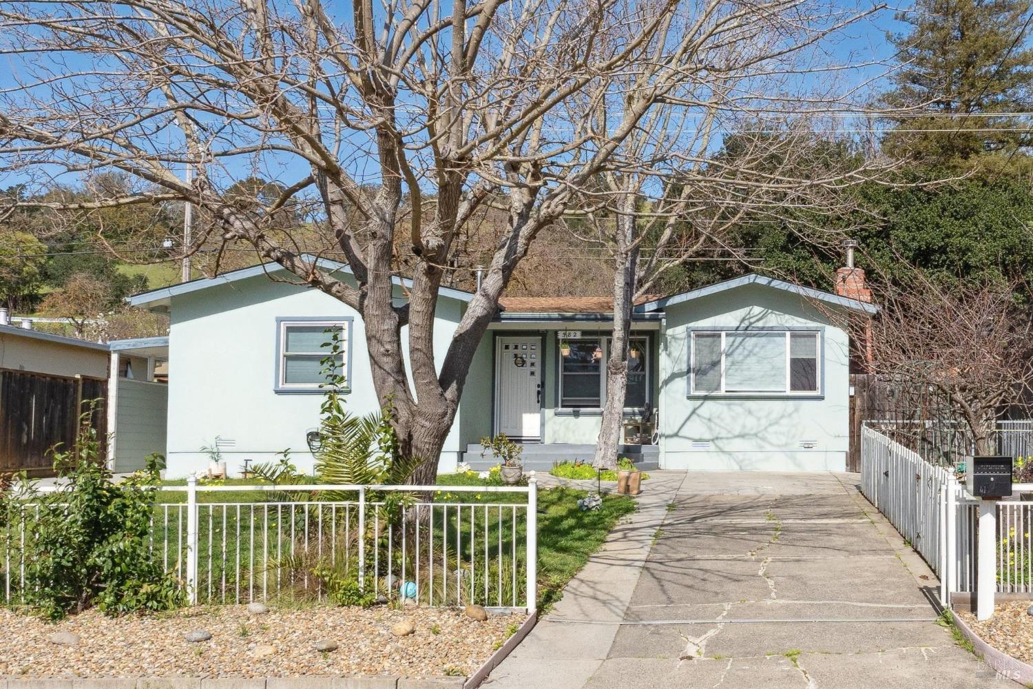 582 Fernando Drive, Unit A Novato, CA 94945 - Photo 14 of 16 a front view of house with trees in the background