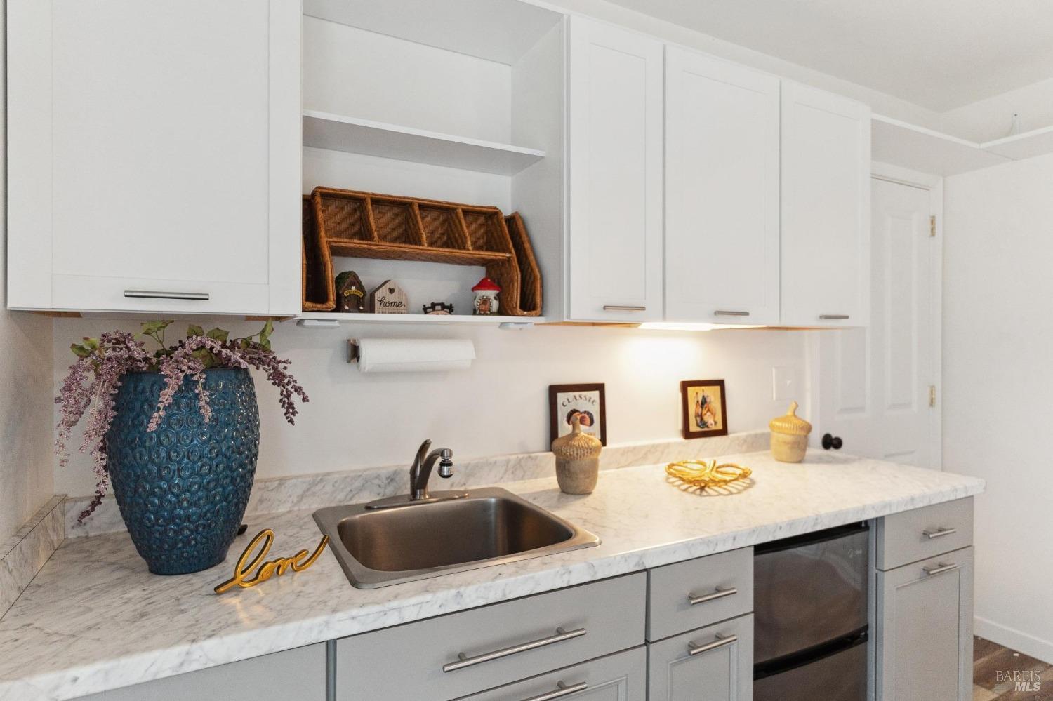 582 Fernando Drive, Unit A Novato, CA 94945 - Photo 3 of 16 a kitchen with a sink and cabinets