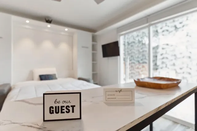 a view of a living room and furniture