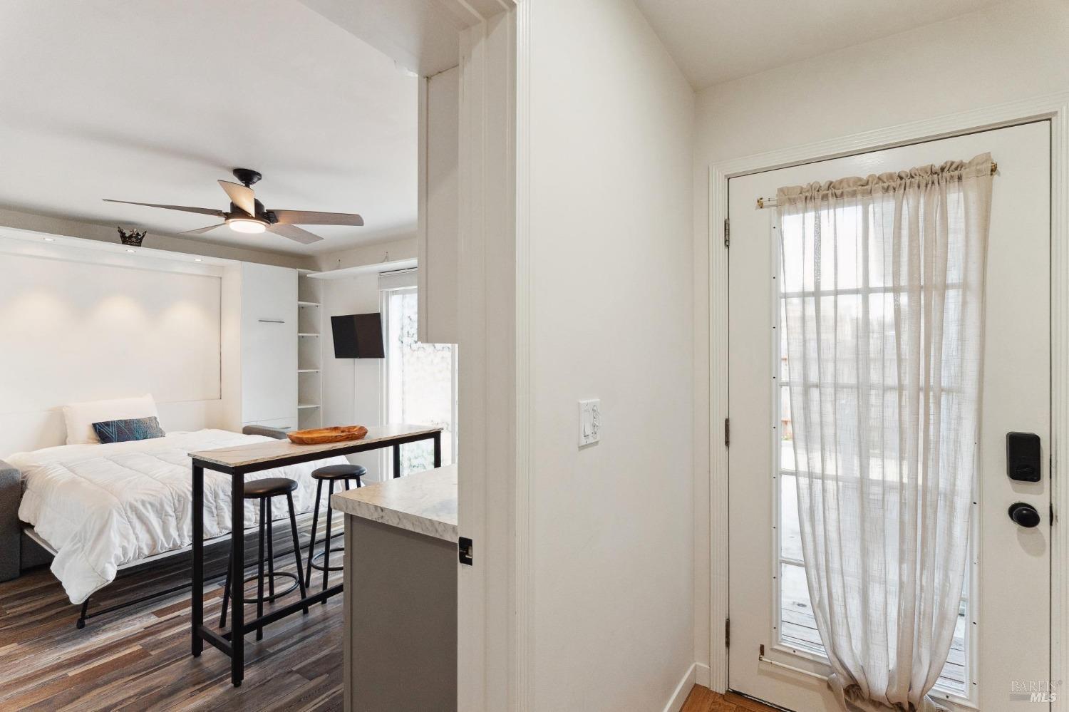 582 Fernando Drive, Unit A Novato, CA 94945 - Photo 6 of 16 a room with a bed and a window