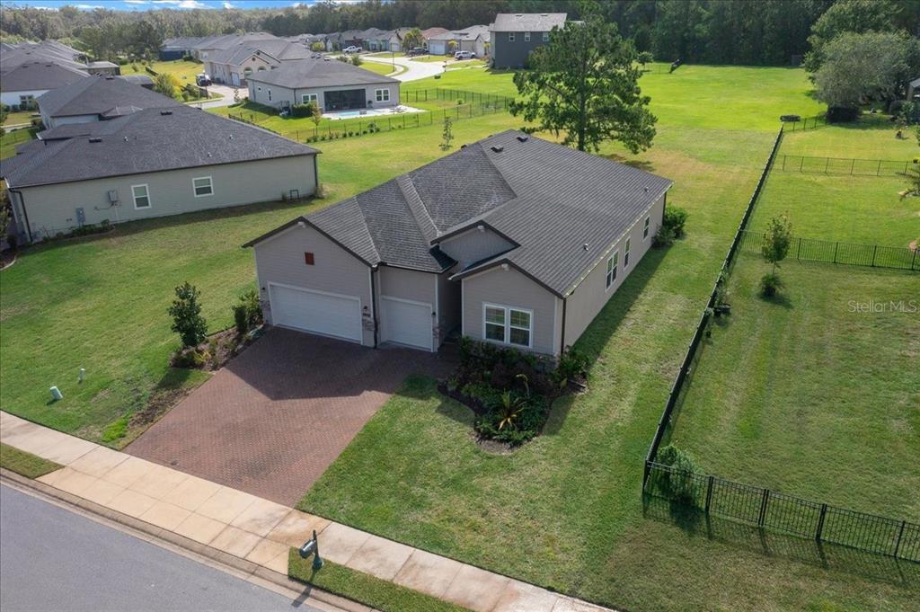 1130 Southeast 42nd Road Ocala, FL 34480 - Photo 3 of 83 an aerial view of residential houses with outdoor space