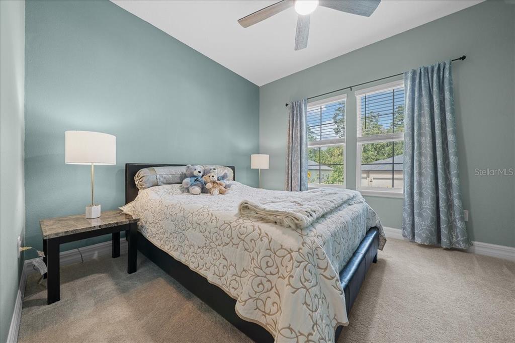 1130 Southeast 42nd Road Ocala, FL 34480 - Photo 37 of 83 a bedroom with a bed and a window