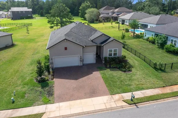 a house view with a garden space