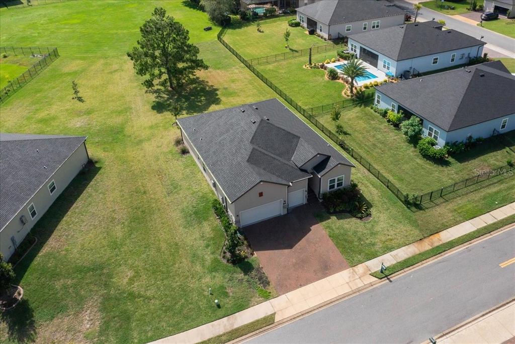 1130 Southeast 42nd Road Ocala, FL 34480 - Photo 5 of 83 an aerial view of a house with a yard