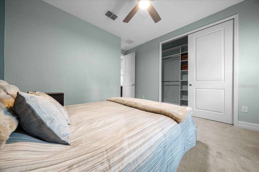 1130 Southeast 42nd Road Ocala, FL 34480 - Photo 53 of 83 a bedroom with a bed and a window