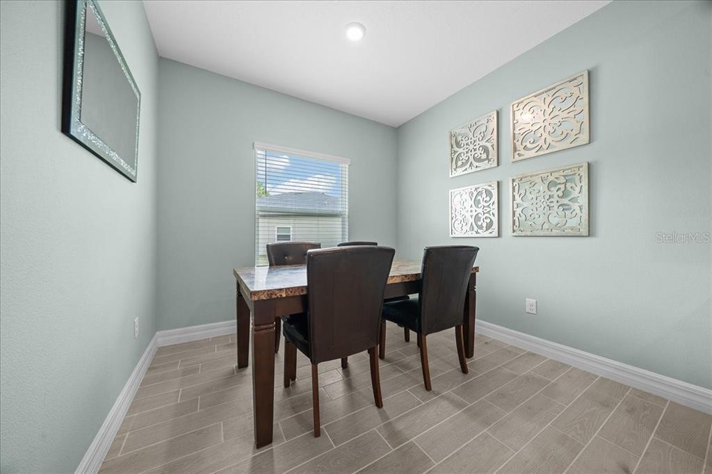 1130 Southeast 42nd Road Ocala, FL 34480 - Photo 63 of 83 a view of a dining room with furniture