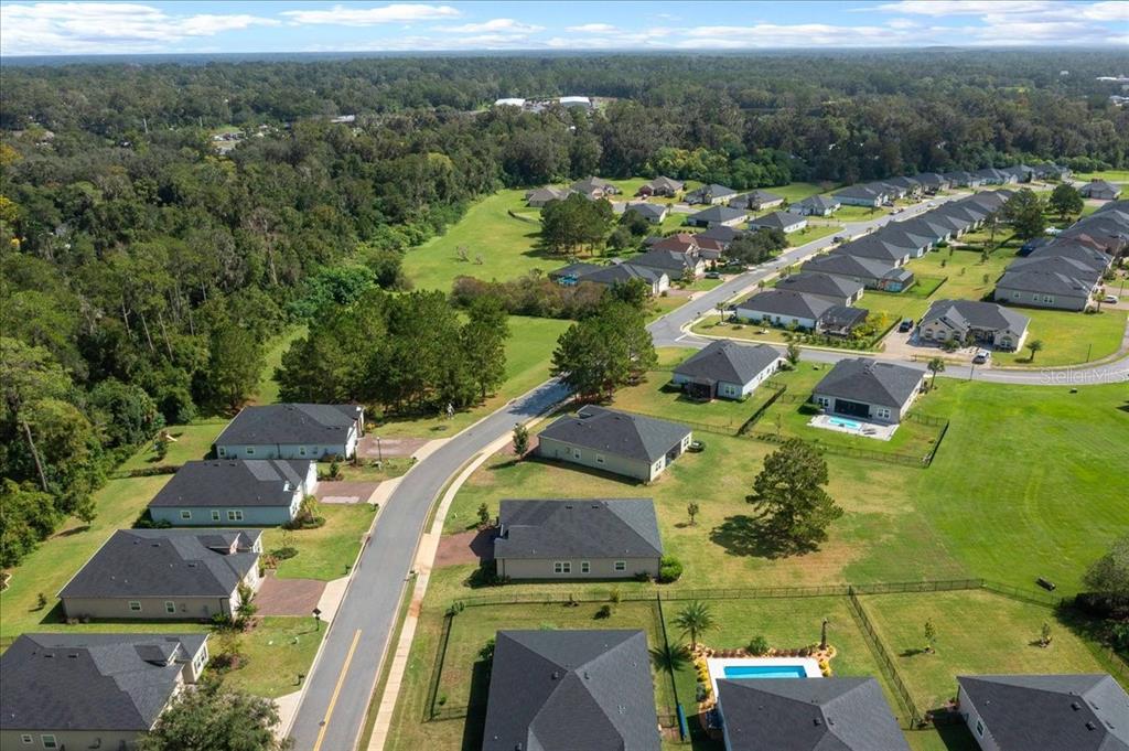 1130 Southeast 42nd Road Ocala, FL 34480 - Photo 9 of 83 an aerial view of residential houses with outdoor space and parking