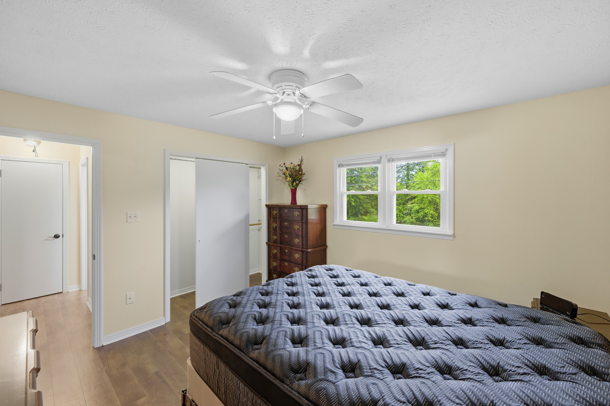 944 Brooksie Thompson Road Decaturville, TN 38329 - Photo 13 of 47 a bedroom with a bed and a window
