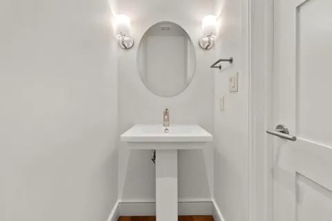 a outdoor dining space with furniture and wooden floor