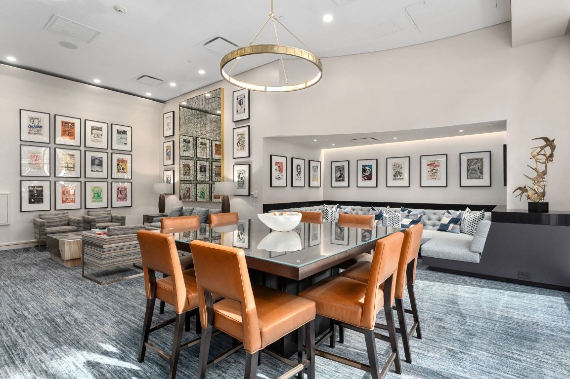 98 San Jacinto Boulevard, Unit 904 Austin, TX 78701 - Photo 18 of 30 a outdoor dining space with furniture and wooden floor