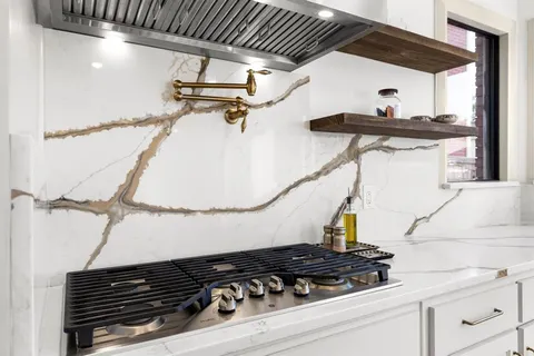 a close view of a stove in the kitchen