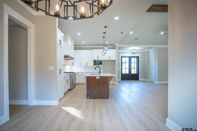 a view of kitchen and windows