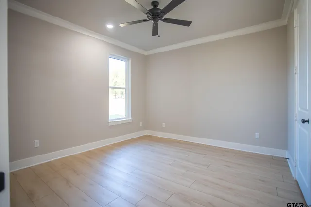 a bathroom with a double vanity sink mirror and bathtub