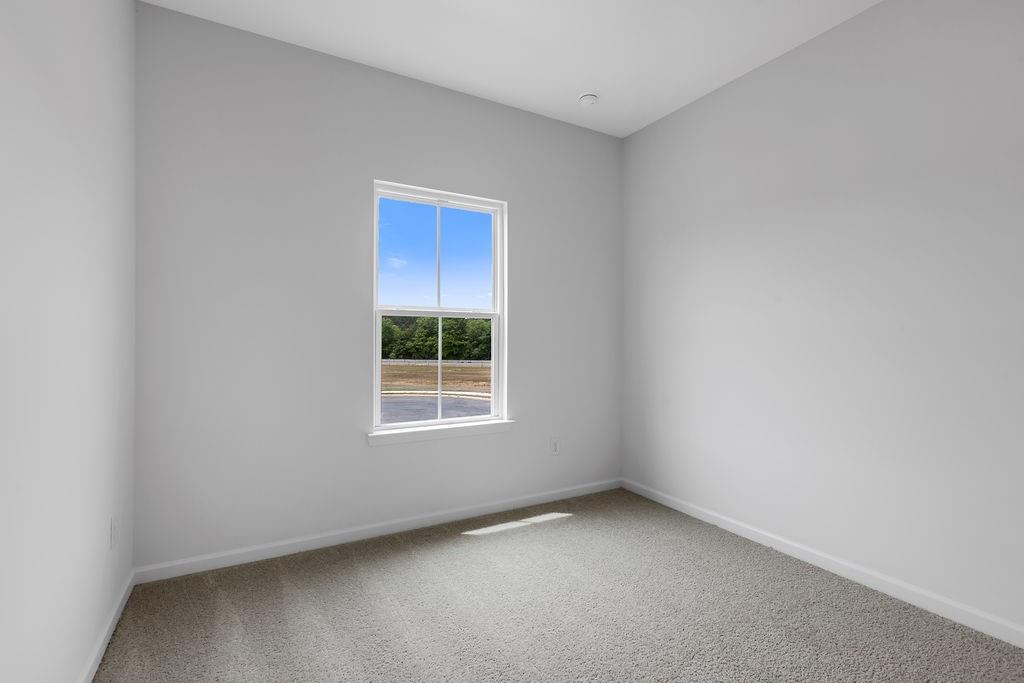 172 Sweet Water Lane Southeast Rome, GA 30161 - Photo 26 of 29 an empty room with a window