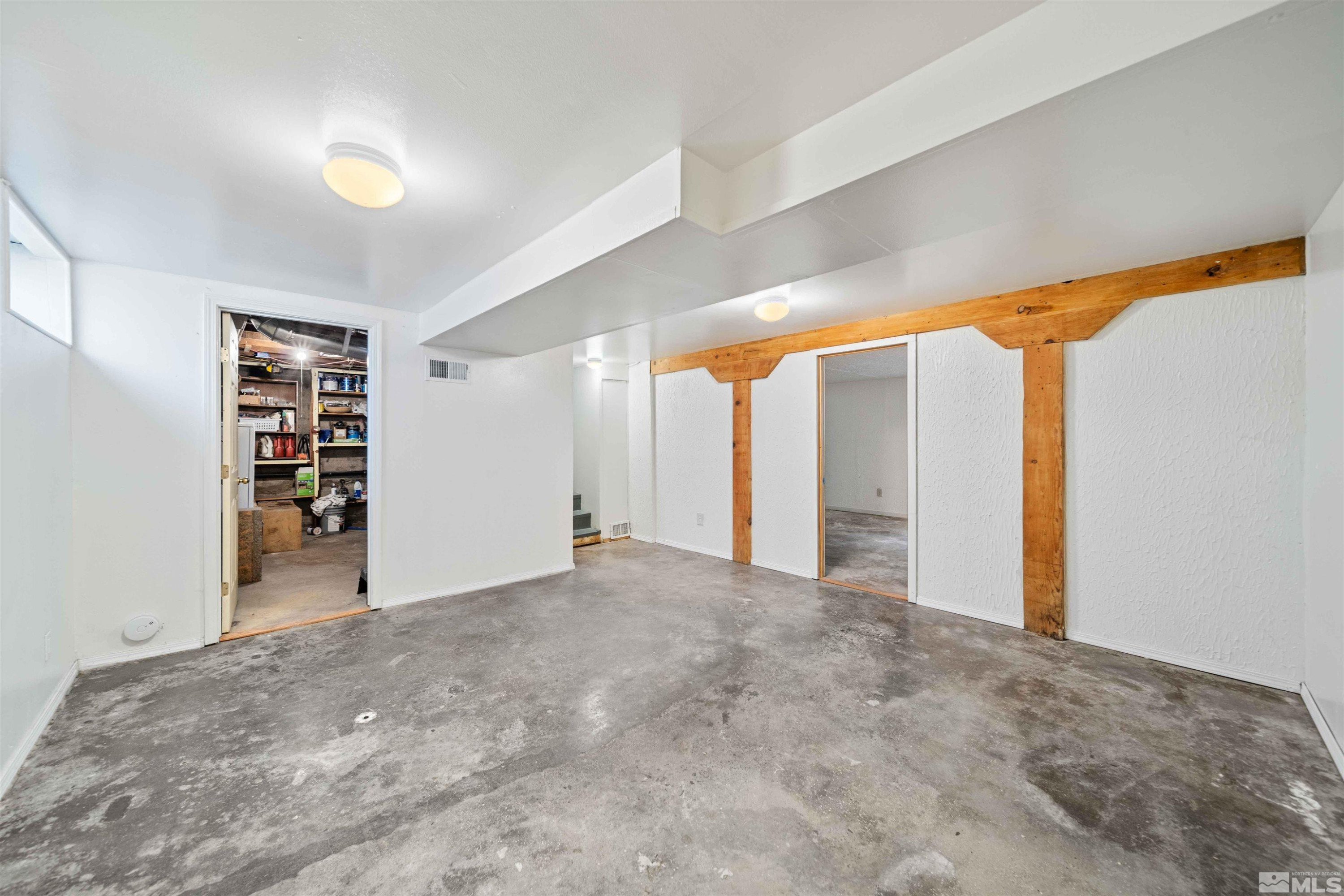 511 Cheney Street Reno, NV 89502 - Photo 12 of 31 a view of empty room with wooden floor and closet