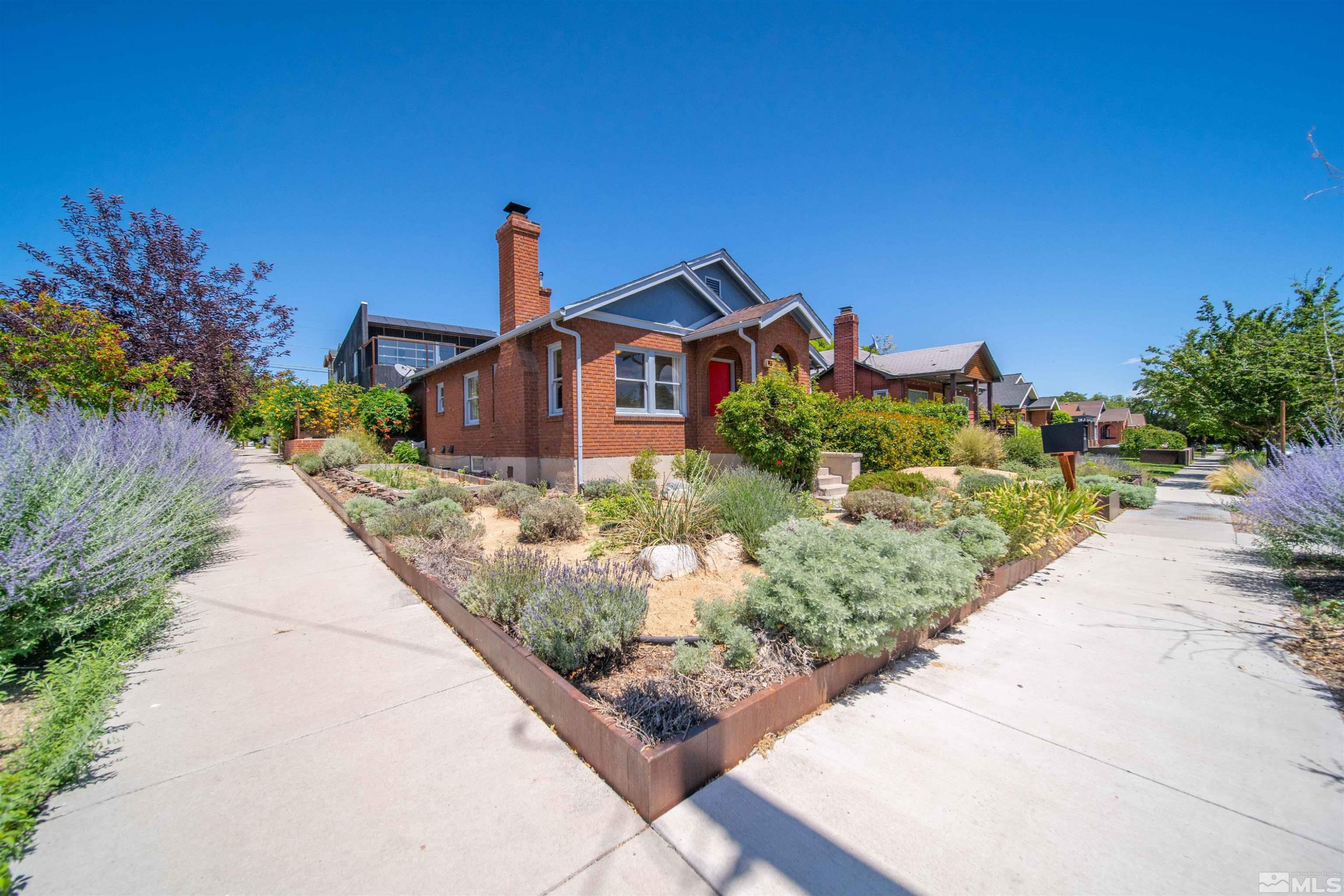 511 Cheney Street Reno, NV 89502 - Photo 29 of 31 a front view of a house with a yard