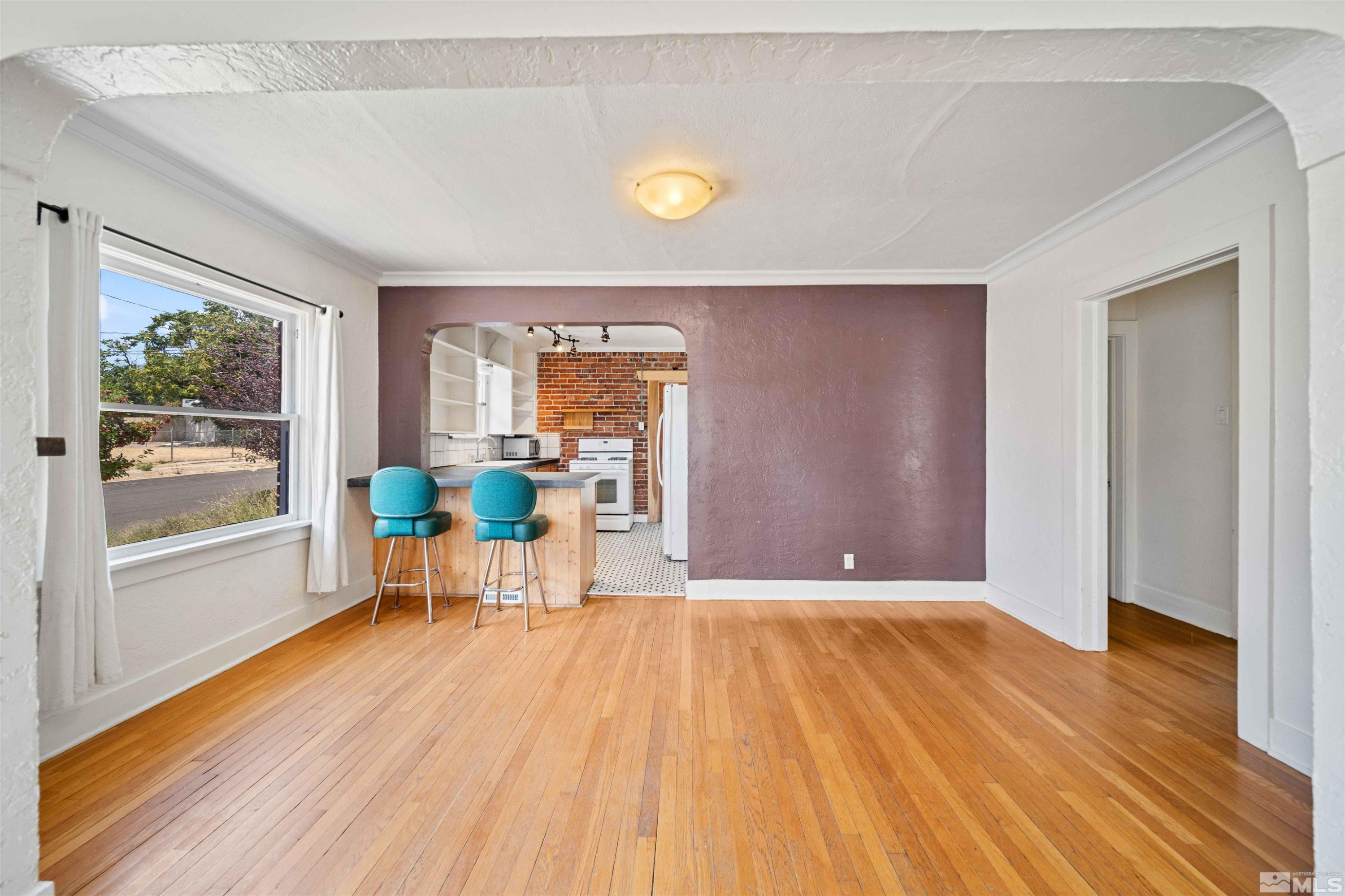 511 Cheney Street Reno, NV 89502 - Photo 7 of 31 a view of a livingroom with furniture and wooden floor