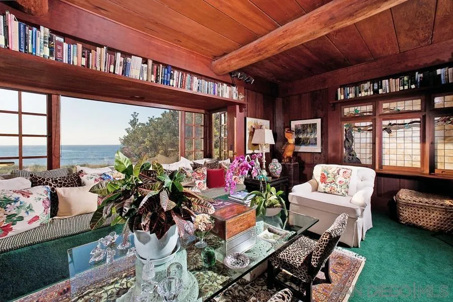 7944 Princess Street La Jolla, CA 92037 - Photo 11 of 39 a living room with patio furniture and a potted plants